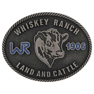 Whiskey Ranch Western Belt Buckle with cattle design – A rugged, oval-shaped men's western belt buckle featuring a detailed cattle head, "Whiskey Ranch Land and Cattle" text, and blue "WR 1906" lettering, finished with a twisted rope border.
